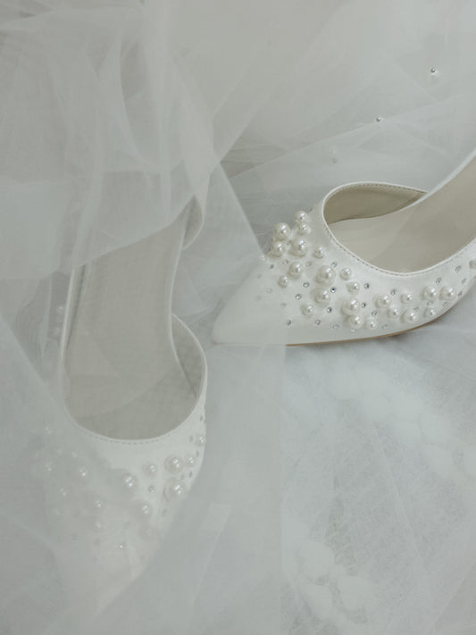 White wedding shoes with beautiful chiffon and pearls